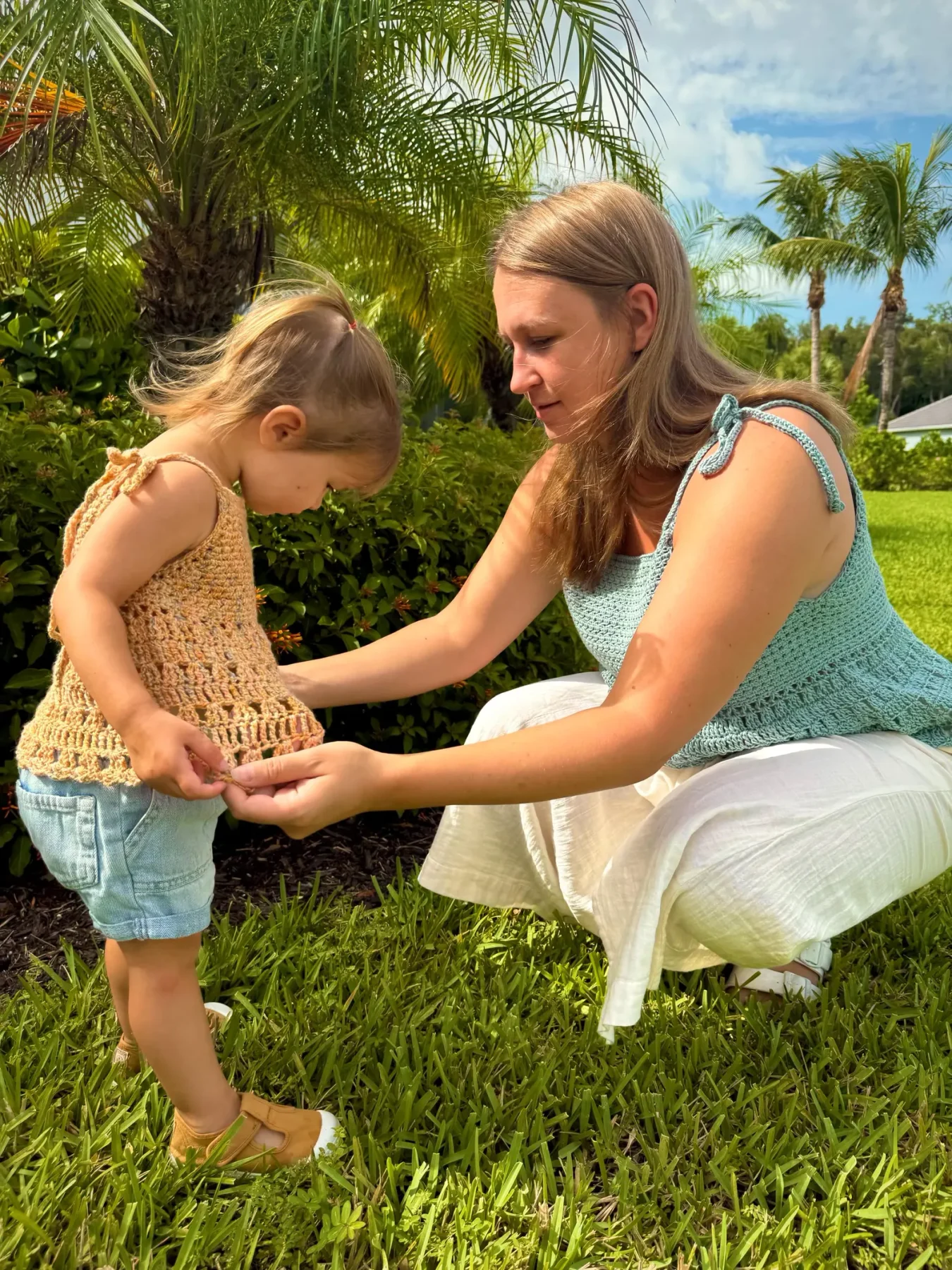 Matching adult and kids' Solara tanks outdoors